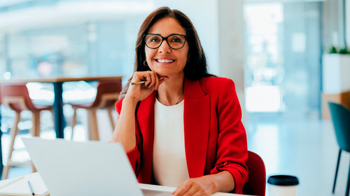 Business person sitting behing computer